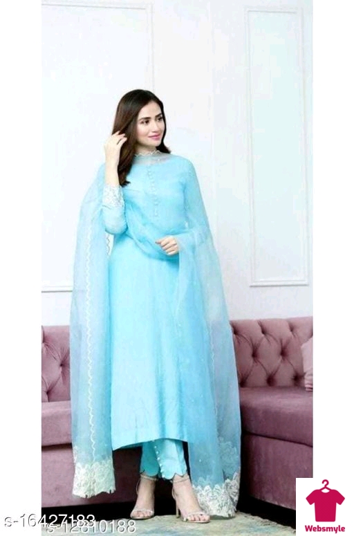 Sky Blue designer kurta with pant and dupatta. designer Calf length kurta has a Round Neck with stylish gold button. Three-quarter sleeves, side slits. Sky blue stylish pant has pearl button and elasticated waistband. Dupatta Has Lace Border.